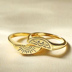 Make a pinky-promise with your best friend with our friendship rings. The ring set is a play on the 80’s trend of gifting a part of a ring to a fellow sister. The signet ring is split into two, with a sunlight design on one ring and a moonlit horizon design on the other. A unique piece which can be worn together or stacked separately.Weight: 5 gWidth: 2 mmHeight: 2.2 mmThickness: 1.5 mmMaterial: 925 SilverPlating Color: Yellow Gold Symbolic Stackable Open Rings For Promise, Trendy Adjustable Stackable Rings For Anniversary, Symbolic Midi Rings As Gifts, Vintage Adjustable Stackable Promise Rings, Adjustable Vintage Stackable Promise Rings, Vintage Sun And Moon Design Rings For Gift, Vintage Sun And Moon Design Rings As Gift, Stackable Couple Rings For Promise, Trendy Open Ring For Promise Occasion