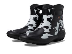 Bogs Patch Ankle - Cow - Women's Boots : Black/White : Keep your feet warm and dry while offering them the desired protection from rain, snow, and wind wearing the Bogs Patch Ankle - Cow Boots. These are 100% waterproof and feature an ultra-soft and flexible rubber upper with a unique animal print for an eye-catching appeal and a removable, contoured BLOOM ethylene vinyl acetate footbed for exceptional comfort with every step. With the Bogs Max-Wick technology, the boots evaporate sweat to keep feet dry. DuraFresh natural bio-technology activates to fight odors. Pull-on handles for easy on and off. Round toe. Built-in heel kick for hands free removal. Flexible and slip-resistant rubber outsole. Imported. Measurements: Weight: 1 lb 1.85 oz Shaft: 6 in Product measurements were taken using s Cow Boots, Cow Products, Bio Technology, Womens Bogs, Black Boots Women, Unique Animals, Boots Black, Hands Free, Product Reviews