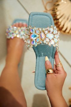 Embellished Summer Beach Sandals, Embellished Sandals For Beach Party, Embellished Sandals For Beach Season Parties, Spring Embellished Blue Sandals, Blue Embellished Sandals For Spring, Spring Blue Embellished Sandals, Trendy Rhinestone Sandals For Summer, Summer Rhinestone Open Toe Flip Flops, Beach Sandals With Rhinestones And Flat Heel