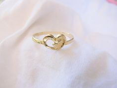 Beautiful two hearts ring.►Material: 14k gold filled.Please convo me if the size that you need is not available.Click here for more ringshttps://www.etsy.com/il-en/shop/MoonliDesigns?ref=hdr_shop_menu&section_id=21288938♥♥♥♥♥♥♥♥♥♥♥♥♥♥♥♥♥♥♥♥♥♥♥► Nickel Free ✔► Tarnish Resistant ✔► No Allergic reaction ✔► 30 days return policy ✔ ► Accept replacements and custom orders ✔♥♥♥♥♥♥♥♥♥♥♥♥♥♥♥♥♥♥♥♥♥♥♥► I ship all items in a jewelry gift box ✔► Greeting card - upon request ✔ ♥♥♥♥♥♥♥♥♥♥♥♥♥♥♥♥♥♥♥♥♥♥♥Shipping Mother Day Jewelry, Heart Ring Gold, Mother Daughter Rings, Daughter Ring, Double Heart Ring, Mom Ring, Green Stone Rings, Allergic Reaction, Jade Ring