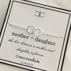 "\"mother + daughter...the love between and mother and daughter is forever\" Double entwined ring bracelet with lobster clasp and 1/2\" extender chain to allow for adjustability for the perfect fit ~All metal components are sterling silver ~Comes packaged on \"mother + daughter\" jewelry card or any other jewelry card designs offered in my shop (please leave selection during checkout, if no selection is made it will be packaged as seen) ~Specially packaged and ready for gift giving Please visit Nickel-free Jewelry For Anniversary On Mother's Day, Nickel-free Jewelry For Wedding And Mother's Day, Meaningful Nickel-free Bracelets For Mother's Day, Mother's Day Keepsake Nickel-free Jewelry, Mother's Day Nickel-free Open Heart Necklace, Daughter Bracelet, Rings Eternity, Eternity Bracelet, Mother Daughter Jewelry