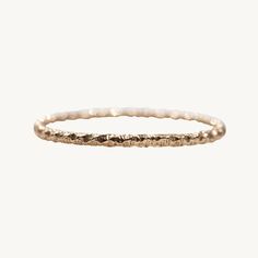 A finely textured extra slim band. Works well as a stacking ring, or on it's own. Also an ideal spacer to sit in between a wedding band and engagement ring. Solid 18k gold, 1.35 mm thick. Wedding Band And Engagement Ring, Ring Wedding Band, Stacking Ring, Ring Wedding, Stacking Rings, Wedding Band, A Wedding, Wedding Bands, Engagement Ring