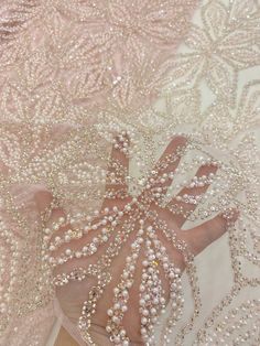 This high quality Fabric is measured in 5 Yards With Embroidered Beading and Sequin. It is soft, very delicate and beautiful. This high Quality Fabric is made with Fashion embroidered rhinestones can be used in making party wedding dresses, skirts, shawls, scarves and other other fashion apparels as you would like. Size : Length : 5 yards (180 inch). Width: 50 inch (Please allow slight deviation for the measurement data ,±1 inch) Material: 100% Polyester, Tulle Lace Fabric, Eco-Friendly embroide Luxury Festive Embroidered Fabric With Gold Embroidery, Luxury Beaded Gold Embroidered Fabric, Elegant Sequin Fabric With Rhinestones For Prom, Elegant Embroidered Fabric With Rhinestones For Wedding, Elegant Rhinestone Embroidered Fabric For Weddings, Elegant Wedding Sequin Fabric With Pearl Embroidery, Wedding Tulle Lace Fabric With Rhinestones, Wedding Lace Tulle Fabric With Rhinestones, Elegant Sequin Fabric With Pearl Embroidery For Banquet