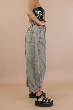 OLI & HALI: Washed Barrel Pants are a fashionable and versatile addition to your wardrobe. These barrel pants offer style and comfort, making them a standout choice for creating trendy outfits. Denim Barrel pants Oli & Hali Denim Button + Zip closure Functional front + back pockets Wide barrel leg Back elastic waistband Washed 100% Cotton Imported Measurements: S Inseam 24" Rise 13 1/4" Waist 28"M Inseam 23 3/4" Rise 13 1/2" Waist 29" L Inseam 24 3/4" Rise 14" Waist 32" XL Inseam 25 1/4" Rise 14 1/4" Waist 34" Model Specs: Emily and Karli are wearing a size small in photos. Syd is wearing a size Xl in the photo. How will this item fit you? Check out our MODEL SPECS (Typical Sizing - Karli: S-Size 5/26 - 5ft 2in, Emily: S-Size 3/25 - 5ft 5in, Syd: L/XL- Size 15/ - 5ft 8in)Need help with siz Elevated Casual Full-length Bottoms With Side Pockets, Trendy Cotton Bottoms With Pull-on Style, Full Length Cotton Cargo Jeans With Elastic Waistband, Spring Cotton Tapered Cropped Jeans, Straight Leg Jeans For Spring Elevated Casual, Spring Cropped Tapered Cotton Jeans, Spring Tapered Cropped Cotton Jeans, Straight Leg Jeans For Elevated Casual Spring Occasion, Spring Casual Straight Leg Jeans