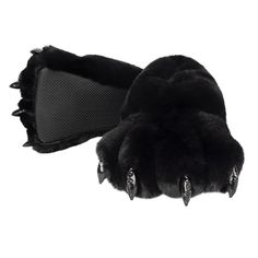 a pair of black slippers with spikes on them