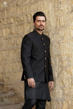 Welcome to Shiraz Saeed Our Retail Store: Rubina's Collection 2070 W Spring creek Pkwy Suite 328 Plano,TX USA 75023 Presenting Men's Black Embroidered Jamawar Prince Coat (Kindly provide your size upon checkout) Color: Black Premium Embroidered Jamawar Banarsi Fabric Italian Thread Simple & Decent Metal Buttons Finest Stitch Branded Design Custom Sizes are also available. Fit Type: Regular fit Disclaimer Due to the photographic lighting & different screen calibrations, the colors of the original product may slightly vary from the picture. Formal Bandhgala With Chikankari Embroidery For Festive Season, Black Prince Coat, Black Dress For Man, Traditional Long Sleeve Sherwani For Semi-formal Occasions, Traditional Zari Work Sets For Semi-formal Occasions, Elegant Nehru Jacket For Groom At Diwali, Semi-formal Nehru Jacket With Dabka For Eid, Traditional Semi-formal Kurta For Transitional Season, Semi-formal Eid Nehru Jacket With Dabka