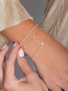 Lemel is known for its dainty gold jewelry! This dainty diamond heart bracelet is the perfect addition to any bracelet stack! Layer it with a paperclip chain bracelet or make a statement with some tennis jewelry!