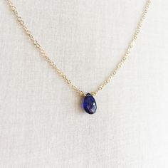 This is a blue sapphire necklace that is made of genuine high quality sapphire. This tiny stone necklace is light weight and elegant. Sapphire is September birthstone. It's a great gift for September birthday friends and families. The sapphire I use in this necklace is translucent with high quality. For this type of gem, the more blue and translucent of the saphire, the more expensive it is. Blue sapphire's hardness is 9 while diamond is 10. Measurement: 9mm by 6mm blue sapphire S for Sparkle on Sapphire Gemstone Drop Necklaces, Sapphire Drop Gemstone Necklace, Sapphire Drop Necklace With Gemstone, Sapphire Drop Necklace For Gift, Sapphire Drop Necklaces For Gifts, Sapphire Teardrop Necklace For Gift, Everyday Sapphire Gemstone Necklace, Sapphire Teardrop Pendant Necklace Gift, Dainty Blue Birthstone Necklace For Everyday