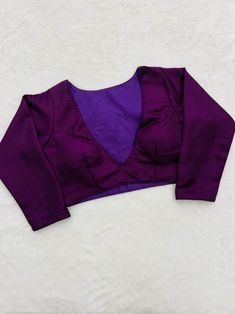 This is a very beautiful handmade purple colour blouse for women and girls. you can wear this blouse on occasions like diwali, wedings, engagement, anniversaries etc. this blouse can be used for gifting purpose also. this trendy beautiful blouse can give your personality a elegant look. you can wear this blouse with very beautiful sarees and lehangas. we will do the customization also as per the customer need. free shipping worldwide Purple Long Sleeve Choli With Pallu, Long Sleeve Purple Choli With Pallu, Purple Long Sleeve Bollywood Choli, Bollywood Style Purple Choli With Long Sleeves, Elegant Purple Blouse For Diwali, Party Blouse Piece In Purple Art Silk, Semi-stitched Purple Blouse Piece For Party, Party Art Silk Blouse Piece In Purple, Purple Silk Blouse Piece For Party