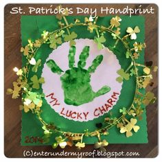 a st patrick's day handprint with shamrocks