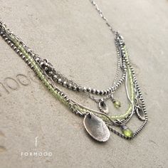 "Delicate necklace is made of sterling silver 925 and peridot (green) or aquamarine (blue) Dimensions: Stones: approx. 1.8 - 8 mm / 0.07\"- 0.31\" length 38-51 cm/15 -20 inches + 5cm / 1.9\" adjustment The necklace worn by the model is 40cm / 16 \" long Thank you for visiting!" Green Oxidized Pendant Necklace, Green Sterling Silver Jewelry With Oxidized Finish, Green Oxidized Sterling Silver Jewelry, Green Sterling Silver Fusion Necklace, Handmade Silver Necklace With Peridot, Handmade Silver Peridot Necklace, Handmade Silver Peridot Necklaces, Silver Peridot Necklaces For Jewelry Making, Peridot Necklace