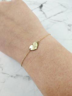 "14K 9K Small heart charm bracelet with Engraved Initial, Solid gold bracelet, Custom Monogram gold bracelet, Personalized gold bracelet, Valentine's Gift, Gift for her, 14K Rose Gold bracelet, Bridesmaid gift, Bridal jewelry, Dainty gold bracelet, FREE EXPRESS SHIPPING Delicate minimalist 14K solid gold bracelet with a small heart charm engraved with one or two initials. A wonderful and thoughtful gift for you and your loved ones! Infinity bracelet: https://www.etsy.com/listing/608986075 Boho e Heart Charm Double Heart Jewelry For Best Friend, Double Heart Charm Jewelry For Best Friend, Personalized 14k Gold Charm Bracelet Gift, Personalized 14k Gold Charm Bracelet For Anniversary, Yellow Gold Charm Bracelet For Valentine's Day Gift, Yellow Gold Charm Bracelet For Mother's Day Gift, Yellow Gold Charm Bracelet Gift For Valentine's Day, 14k Gold Bracelet Gift For Mother's Day, Dainty Yellow Gold Heart Bracelet For Mother's Day