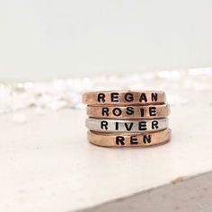 We are so excited to add our Little Id Personalized Stacking Rings to our ring collection. Perfect for stacking just like our original name ring but a little more delicate and feminine. Featuring an upper case letter font, you can comfortably stack up to 5 of these rings. Created to mix and match perfectly with the rest of our collection so you can create a ring stack that's just right for you. Keep your loves close, commemorate a special date or a short meaningful message, use symbols, it's tot Diamond Initial Necklace, Name Ring, Name Rings, Ring Stack, Stone Feature, Ring Collection, Gold Filled Ring, Upper Case, One Ring