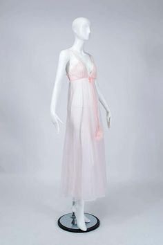 For Sale on 1stDibs - Too beautiful to be kept in the bedroom, this negligée is lovely enough to wear in public. The 2 ½ foot marabou feather cords may be tied in front or back Vintage Sheer Sleepwear For Night, Pink Sheer Sleepwear For Wedding Night, Vintage Sheer Pink Nightgown, Vintage Pink Sheer Nightgown, Pink Sheer Vintage Nightgown, Sheer Pink Nightgown For Night, Sheer Pink Nightgown For Wedding Night, Vintage Pink Dress For Night Occasion, Vintage Pink Dress For Night