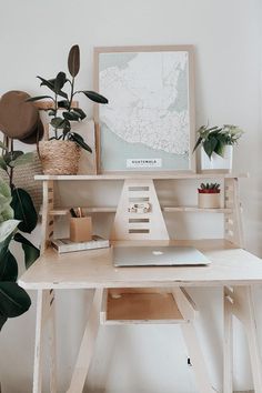 A wooden standing desk with a laptop in a home office. At Home Office Decor, Home Office In Bedroom, Wfh Tips, Office In Bedroom, Home Desks, Office Ergonomics, Wfh Desk, Workspace At Home, Plant Inspiration