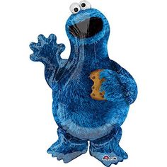 the cookie monster is waving and holding something in his hand