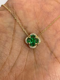 "Gorgeous natural emerald and diamond necklace yellow gold.  These real emeralds are clear green color, full of life to them.  So hard to match these perfectly and these are just beautiful!  Excellent craftsmanship, lays nicely on the neck, won't flip around.   Pendant is about 11.5 x 12mm.  The chain can be worn at 18\", 17.25\", or 16.5\" lengths.   Genuine earth mined emeralds  Total weight: 0.70 Carats Genuine round brilliant cut diamonds  Total weight: 0.15 carats  Solid 18K Yellow Gold 3.2 Green Emerald Diamond Necklace For May Birthstone, Green Emerald Diamond Pendant Necklace, Green Diamond Necklace Fine Jewelry, Fine Jewelry Green Diamond Necklace, Fine Jewelry Green Diamond Necklace For Anniversary, Fine Jewelry Green Necklace With Diamond Accents, Luxury Green Diamond Necklace For May Birthstone, Fine Jewelry Green Necklaces With Diamond Accents, Green Diamond Necklace In Fine Jewelry Style