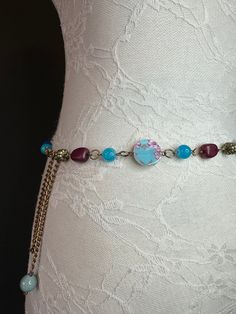 Beautiful handmade beaded belt with gorgeous beads.  Size 20"-30" can also be worn as a necklace.  Perfect for swimwear, resort wear, dresses & gifts.  Colour: Multi.  Select your waist size from the selection. We will add 12-14" extra chain to make the belt adjustable on the waist.  For further bespoke sizes, send me a convo.  Lovely accessory to complement dresses, tops, fit through jeans loops, swimwear, resort wear.  Unique ring design. Fan Design, Fan Fashion. Bohemian Adjustable Chain Belt As A Gift, Bohemian Beaded Waist Chain, Bohemian Waist Chain With Colorful Beads For Festivals, Bohemian Colorful Beads Waist Chain For Festivals, Multicolor Bohemian Waist Chain For Festivals, Bohemian Multicolor Waist Chain For Festival, Bohemian Waist Chain With Adjustable Round Beads, Bohemian Waist Chain With Round Beads, Bohemian Style Adjustable Chain Belt