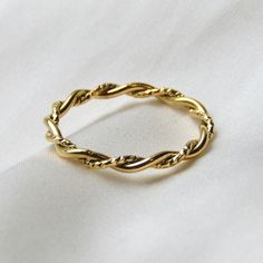 *18k gold plated stainless steel ring Currently available in 3 sizes! *US size 6 (Pandora 52, UK L - L 1/2) *US size 7 (Pandora 54, UK M 1/2 - N 1/2) *US size 8 (Pandora 57, UK P 1/2 - Q) Gold Twisted Promise Ring, Twisted 14k Gold Ring, Twisted Gold Ring For Gift, Minimalist Twisted Gold Rings, Twisted Gold Anniversary Rings, Gold Twisted Stackable Jewelry, Gold Plated Twisted Jewelry Gift, Yellow Gold Twisted Ring For Gift, Gold Midi Rings For Promise With Modern Twist