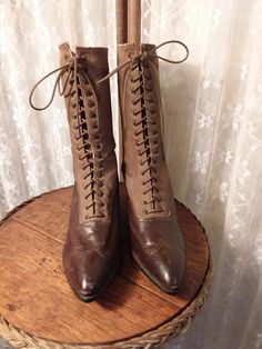 Women's Victorian shoes Ca 1900's Brown leather and tan canvas uppers 16 hole lace up high tops 1.75' stacked heels Foot Schulze Co., Saint Pauls Excellent condition I have been collecting vintage and antique clothing and accessories for 35 years and have decided it is time to downsize. I will be posting items from my inventory and my personal collection. If you have a particular area of interest please let me know. Judi Vintage Lace-up Boots With Brogue Detailing, Vintage Lace-up Boots With Leather Sole For Formal Occasions, Vintage Lace-up Boots With Pointed Toe And Leather Sole, Vintage Lace-up Boots With Leather Sole For Fall, Vintage Leather Sole Lace-up Boots For Fall, Vintage Lace-up Boots For Formal Fall Events, Vintage Lace-up Boots For Formal Fall Occasions, Vintage Leather Lace-up Boots With Pointed Toe, Vintage Fitted Boots With Laces