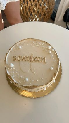 a cake that is sitting on top of a table with the word svanteen spelled in frosting