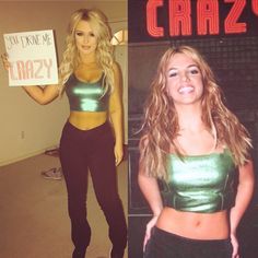 a woman holding up a sign next to a photo of herself in green top and black pants