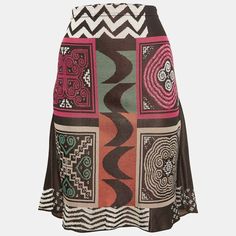 This Skirt From Etro Will Deliver A Sense Of Femininity And Class To Your Attire. It Is Created From Multicolored Fabric And Shows A Geometric Style. Match This Skirt With A Basic Crop Top And Look Nothing But Gorgeous. Fitted Multicolor Asymmetrical Skirt, Multicolor Lined Wrap Skirt, Multicolor Asymmetrical Lined Skirt, Multicolor Fitted Long Wrap Skirt, Multicolor Silk Skirt, Multicolor Silk Flowy Skirt, Multicolor Flowy Silk Skirt, Elegant Multicolor Silk Bottoms, Fitted Multicolor Lined Wrap Skirt