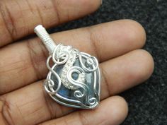 You will receive 1 Labradorite heart Wire Wrapped pendant Silver Wire Filigree Art Wire Wrap Pendant handmade Bohemian Tribal Jewelry Beautiful Natural jewelry . Stone : Labradorite Size: 40 mm long include bail Many thanks for you visit my store ♥ if you have any question please contact us. For wholesale Price Please Convo me. You can order different items as many you like . Handmade Heart-shaped Jewelry For Festivals, Artisan Heart Shaped Jewelry For Crafting, Unique Wire Wrapped Heart Pendant Jewelry, Spiritual Handmade Jewelry With Heart Pendant, Bohemian Wire Wrapped Heart Pendant Jewelry, Bohemian Nickel-free Heart Pendant Jewelry, Nickel Free Heart Shaped Jewelry For Festivals, Nickel-free Heart-shaped Jewelry For Festival, Unique Handmade Heart Pendant Jewelry