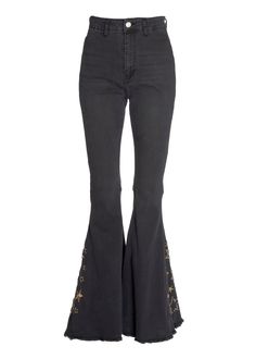 Badass tendencies! You and these babies are meant to be! With a high rise and dramatic flare, these stretch bell bottoms make your legs look a mile long with retro-inspired style that feels cool and modern! The flare pants come in black denim and feature a gold star design that rounds up the `70s swagger of these bells. The vintage-inspired bell bottom jeans feature a zip fly closure, pockets at back and a raw hem. Flirty flare features a slender fit through hip and thigh with a dramatic flared Bell Jeans, Penny Lane Coat, Blue Choker, Bottom Jeans, Bell Bottom Pants, Satin Maxi Dress, Star Design, Bell Bottom, Gold Star