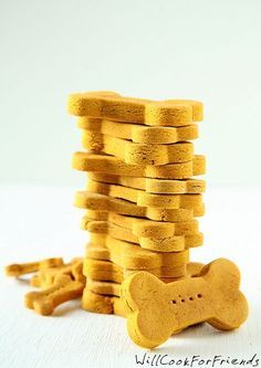 a stack of cookies with a dog bone on top