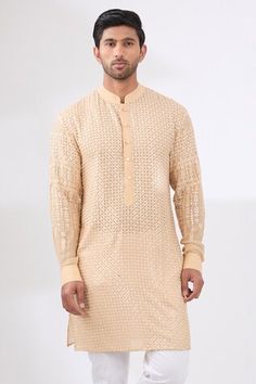 Beige kurta with sequin and thread tonal embroidery in geometric pattern. Paired with a white pant. - Aza Fashions Traditional Wedding Wear With Geometric Embroidery, Fitted Traditional Wear With Geometric Embroidery For Transitional Season, Fitted Traditional Wear With Geometric Embroidery, Traditional Fitted Kurta With Geometric Embroidery, Geometric Embroidered Kurta For Eid Wedding, Festive Geometric Embroidery Straight Kurta Set, Straight Kurta With Geometric Embroidery In Chanderi, Festive Beige Kurta With Cutdana, Diwali Fitted Kurta With Geometric Embroidery