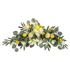 a bunch of yellow and white flowers with green leaves on the top, in front of a white background