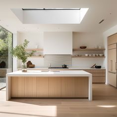 a kitchen with wooden cabinets and white counter tops, along with an open skylight