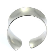 Tapered Brushed Anticlastic Aluminum Bangle Bracelet - johnsbrana - 4 Adjustable Metal Cuff Bracelet With Polished Finish, Classic Metal Cuff Bracelets, Classic Metal Cuff Bracelet, Modern Silver Bracelet With Shiny Finish, Polished Stainless Steel Bangle Cuff Bracelet, Stainless Steel Polished Cuff Bracelet, Polished Stainless Steel Cuff Bracelet, Formal Stainless Steel Cuff Bracelet With Polished Finish, Silver Stainless Steel Bangle With Polished Finish