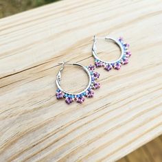 Add a splash of beachy colors to your summer!  Handmade hoop earrings created with fine glass seed beads in shades of Plum, Blush and Pink Lilac delicately woven onto Stainless Steel hoops.   💜 Everything at CyntheCreations is handmade with love - because you deserve to feel extraordinary! 💜  👉  Arrives in a gift box with bow, ready for giving. 🎁 👉  Measurements:  1 3/8 inches around. 👉  Lightweight and easy to wear 👉  304 Stainless Steel hoops 👉  Miyuki and Toho glass seed beads 👉  Thermally-fused extra strong thread For different colorways and styles, visit my shop:  https://www.etsy.com/shop/CyntheCreations ⭐  THINGS TO KNOW ABOUT BEADED JEWELRY:  While sealed for normal wear, glass beads are NOT WATERPROOF and should not be worn when swimming or bathing.     💜𝑫𝒆𝒔𝒊𝒈𝒏𝒆𝒅 Beaded Bohemian Hoop Earrings For Summer, Summer Beaded Earrings With Tiny Beads, Bohemian Hoop Earrings With Dangling Beads For Summer, Bohemian Hoop Earrings With Ear Wire For Summer, Bohemian Hoop Earrings For Summer, Bohemian Small Hoop Earrings For Summer, Summer Festival Hoop Earrings With Dangling Beads, Bohemian Beaded Hoop Earrings For Summer, Bohemian Hypoallergenic Hoop Earrings For Festivals