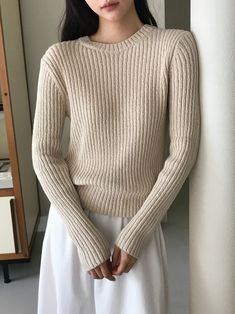 Superb 100% cotton fabric in this high rounded neckline long sleeve knit. Fitted silhouette and comfortable style. Model is in MINUSEY ONE SIZE. ✔️ Free worldwide express shipping over $100✔️ Loved by 6,500+ customers✔️ Limited edition collections, maximum style⠀⠀⠀⠀⠀⠀⠀⠀⠀Stay ahead of the trend with can’t-find-anywhere-else staples. Your closet will thank you 💕* MINUSEY ONE SIZE = EU 34-38, US 2-6* 100% Cotton* Dry clean* Made in Korea - Model Height: 172cm/5'7" (US2, EU34) Cream Sweater With Ribbed Neckline For Winter, Beige Fine Knit Long Sleeve Sweater, Beige Long Sleeve Fine Knit Sweater, Beige Winter Sweater With Ribbed Neckline, Beige Fitted Crew Neck Sweater, Beige Long Sleeve Sweater For Work, Cream Ribbed Crew Neck Sweater, Winter Workwear Sweater With Ribbed Neckline, Fitted Beige Crew Neck Sweater