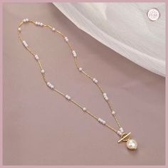 Add a touch of elegance and sophistication to your style with our pearl necklace. Crafted from high-quality stainless steel, this exquisite piece radiates beauty and charm, making it the perfect accessory for both casual and formal occasions. Whether you're getting ready for a special event or simply looking to elevate your everyday attire, this necklace will instantly become a must-have in your jewelry collection. Treat yourself or surprise a loved one with this timeless piece that will never g Elegant Pearl Pendant Chain Necklace For Jewelry Making, Elegant Pearl Drop Chain Necklace, White Dainty Pearl Necklace With Metal, Elegant Pearl Charm Chain Necklace Gift, Elegant Gold Toggle Necklace With Pearl Charm, Elegant Gold Toggle Necklace, Gold Toggle Necklace With Pearl Charm, Elegant Chain Necklace With Pearl Charm Gift, Elegant Metal Toggle Necklace With Adjustable Chain