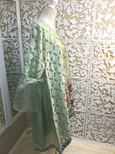 Very chic mint green jamawar on organza jacket, with bell sleeves and floral embroidery, it comes with silk matching inner, and ivory bell bottom. Brand: Bonita, Chen One Shipping USPS 2 day Spring Embroidered Tissue Silk Kurta, Spring Embroidered Silk Sharara, Green Silk Set With Floral Embroidery, Green Floral Embroidered Sharara, Traditional Tissue Silk Sets For Spring, Pista Green Long Sleeve Silk Kurta, Spring Anarkali Tissue Silk Kurta, Green Sharara With Floral Embroidery, Green Designer Dupatta For Spring