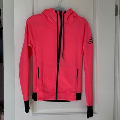 Nwot Adidas Track Hoodie Jacket Xs. Gorgeous Bright Coral Pink Color With Black Adidas Logo And Trim And Zipper. Jacket Features Thumb Holes. Sportswear Fleece Jacket With Double-lined Hood For Winter, Winter Sportswear Fleece Jacket With Double-lined Hood, Winter Athleisure Fleece Jacket With Double-lined Hood, Winter Athleisure Hoodie For Cold Weather, Winter Sportswear Fleece Jacket With Adjustable Hood, Sporty Hooded Fleece Outerwear, Sporty Winter Track Jacket Hoodie, Athleisure Hooded Fleece Jacket For Winter, Winter Fleece Jacket With Adjustable Hood