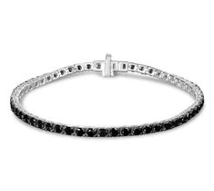 In search of a present that feels more personal to their style? A gift of this black diamond tennis bracelet is edgy, cool, and so next level. From Haus of Brilliance. Black Diamond Bracelet, Diamond Tennis Bracelet, A Present, Tennis Bracelet Diamond, Tennis Bracelet, Black Diamond, Next Level, Diamond Bracelet, Jewelry Bracelets