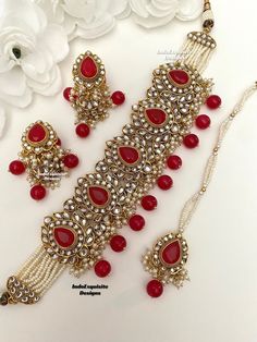 Premium Quality Kundan Pearls Choker Set with Jhumki earrings and Tikka/Indian Jewelry/ High quality kundan Polki jewelry/pearls choker/red  All items are shipped from Brampton, Ontario, Canada. If you need your item by a certain day, please reach out to us for express delivery option before placing the order so that we can update the shipping for you. Standard shipping/delivery timeline Below are the estimated delivery times after the order is shipped/dispatched.  ---> USA delivery timeline * 3 Luxury Red Kundan Necklace For Formal Occasions, Luxury Red Kundan Necklace With Intricate Design, Luxury Red Kundan Necklace For Festivals, Luxury Red Kundan Chandbalis, Luxury Red Kundan Jewelry, Tikka Indian Jewelry, Pearls Choker, Brampton Ontario, Jewelry Pearls