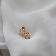 Sweet and delicate star CZ stud earrings. Small. Dainty Star Charm Piercings For Gifts, Elegant Hypoallergenic Star Earrings, Dainty White Earrings With Star Charm, Gold Piercings With Star Charm As Gift, Dainty Star-shaped Earrings For Anniversary, Dainty Star-shaped Piercings As Gift, Elegant Gold Star Piercings, Dainty Gold-plated Earrings With Star Charm, Gold Small Hoop Earrings With Star Charm