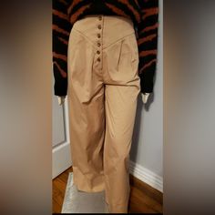 Elevate Your Wardrobe With These Chic Gianni Bini Khaki Chino Pants. The Pleated Front And Wide-Leg Style Add A Touch Of Sophistication, While The High-Rise Waist And Button Closure Provide A Comfortable And Secure Fit. With Pockets For Added Convenience, These Pants Are Perfect For Any Occasion. Crafted With Care And Machine Washable For Easy Maintenance, These Pants Are A Must-Have For Any Fashion-Forward Woman. Available In Beige Color, These Pants Are Sure To Complement Any Personal Style. I Khaki Chino Pants, Chino Pants, Khaki Chinos, Gianni Bini, Chinos Pants, Beige Color, Pant Jumpsuit, Fashion Forward, Personal Style