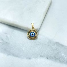 "18k Gold Filled Blue Enamel Evil Eye, Greek Eye with Ethnic Details Circle Charm Pendant, Wholesale Jewelry Making Supplies - Pendant Size: Length: 19mm | Thickness: 15mm 💎 With new products daily, quality, and competitive prices, in DiJu Jewelry you find the most unique styles of modern designs, always looking for elegance and market trends. *Helping your Jewelry Businesses Grow *Starting your Own Business *Making your Own Collection: DiJu Jewelry ever brings Better Moments to your Life. 📲 F Spiritual Blue Tarnish Resistant Jewelry, Traditional Engraved Blue Jewelry, Symbolic Blue Engraved Jewelry, Gold Evil Eye Pendant Jewelry, Gold Spiritual Jewelry With Evil Eye, Blue Gold Plated Jewelry With Charms, Nickel-free Blue Gold-plated Jewelry, Symbolic Blue Round Jewelry, Traditional Blue Brass Jewelry