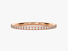 This Alternating Diamond Birthstone Ring in 14K Solid Gold is the perfect addition to any luxury look. Featuring a stunning eternity design and crafted from solid gold, its sophisticated and tasteful aesthetic will make a lasting impression. Add a touch of elegance to your look with this timeless piece. Formal Eternity Band With Halo Setting, Elegant Stackable Diamond Rings In Rose Gold, Luxury Eternity Band Promise Ring, Classic Stackable Rings With Halo Design For Formal Occasions, Formal Diamond Eternity Band With Halo Setting, Elegant Rose Gold Diamond Stackable Rings, Classic Formal Stackable Rings With Halo Design, Elegant Stackable Rings With Brilliant Cut, Elegant Stackable Half Eternity Rings