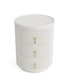 a white cabinet with gold handles and knobs on the front, against a white background