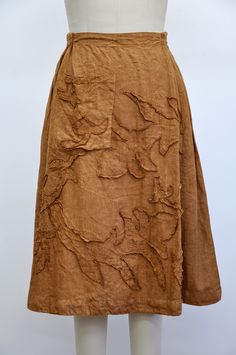 a mannequin wearing a skirt made out of fabric