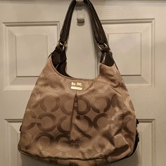 Beautiful Khaki Canvas Type Coach Bag With Brown Leather Handles. Burgundy Lining. Perfect Condition. Never Used. Coach Beige Tote Bag, Coach Beige Bag For Everyday Use, Beige Coach Bag With Detachable Strap, Everyday Beige Coach Bag, Coach Cream Hobo Shoulder Bag, Coach Beige Shoulder Bag Large Capacity, Coach Beige Shoulder Bag With Large Capacity, Coach Beige Bags With Leather Handles, Coach Cream Shoulder Bag For Daily Use