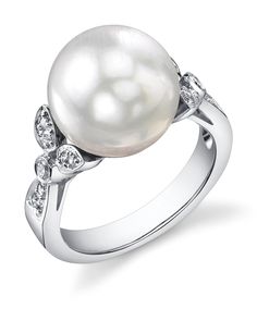 This gorgeous 18K white gold pearl ring is mounted with a beautiful 12mm AAA quality white south sea pearl with 'Very High' luster (please see our pearl grading section for more information). This beautiful pearl ring includes .25 carats of SI-quality diamonds and is made of 5.77 grams of the highest quality 14K gold. All pearl rings are approved by our staff of GIA pearl experts and come packaged in a beautiful pearl jewelry box. Please view the options below to customize your pearl ring to you White Gold Pearl Ring, Pearl Rings Vintage, Pretty Engagement Rings, Pearl Rings, Casual Rings, Gold Pearl Ring, Rings Vintage, Sea Pearl, White Jewelry