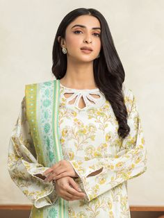 Brand: edenrobe Product: EWU24A1-29022-3PCollection: Allure Lawn Unstitched - Spring Summer CollectionFabric: Lawn DESIGN DETAILS: 3M Printed Lawn Shirt 2.5M Printed Lawn Dupatta 1.8M Dyed Trouser DISCLAIMER:* Lining, Laces, and Tassels are not included in unstitched variants.* Embellishment items in stitched outfits are subject to market availability.* The actual colors of the outfit may vary from the colors being displayed on your device. CARE INSTRUCTIONS: Extra Fabric Has Been Used For Shoot Original Color May Vary Slightly From The Picture Dry Clean Recommended Iron The Clothes At Moderate Temperature Do Not Use Bleach, Or Stain Removing Chemicals Damp Fabric Should Not Be Exposed To Sunlight edenrobe Allure Lawn Spring Summer Collection Authenticity Guaranteed – 100% Original Brand 3 Lawn Design, Lawn Shirts, Extra Fabric, Fabric Stores Online, Jacquard Fabric, Designer Suits, Product Label, Fabric Store, Summer Collection